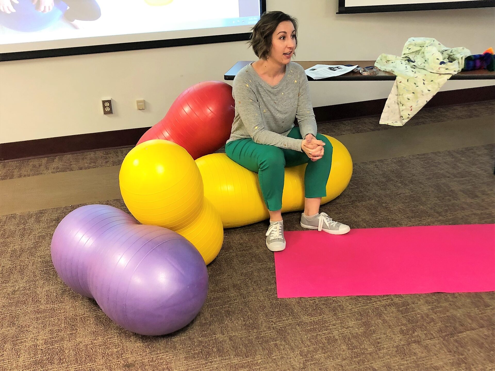 Mandy Sitting On Peanut Ball Teaching - The Birth Nurse®